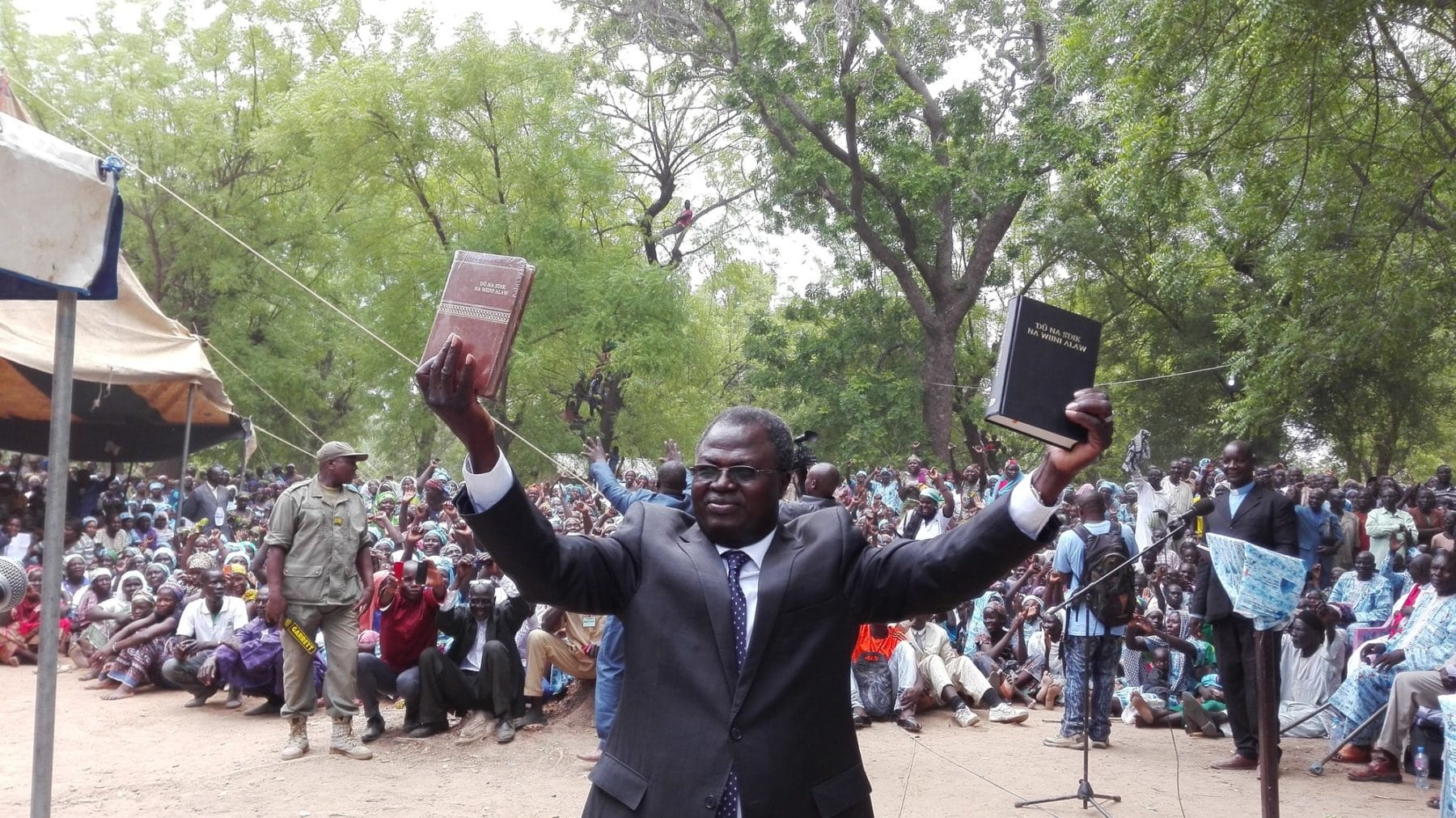 "Here is your Bible!" Bible Society of Cameroon General Secretary Luc Gnowa said to the 5,000 Musgum Christians gathered at the launch of the very first Musgum Bible in the town of Pouss in Cameroon, on May 28, 2016.