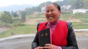 Tang Xinnian received her Bible after waiting 14 years